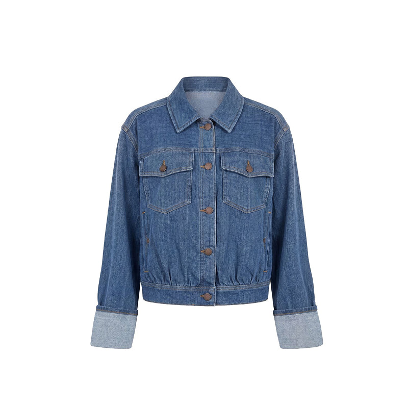 A classic blue denim jacket with a button-up front, two chest flap pockets, and rolled cuffs showing a lighter blue lining, displayed on a clean white background.