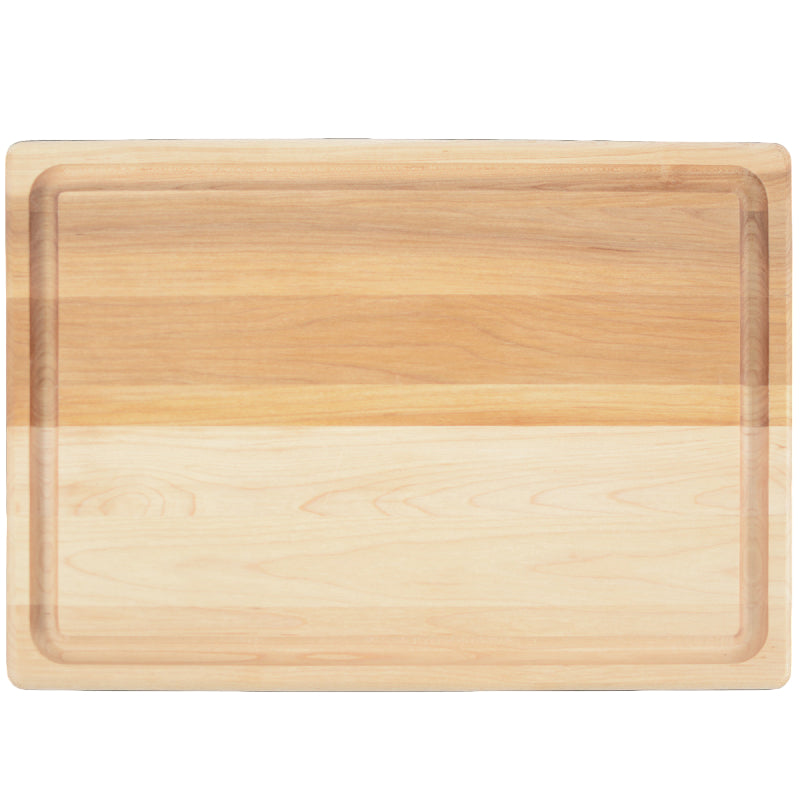 Wooden cutting board with a light finish on a white background