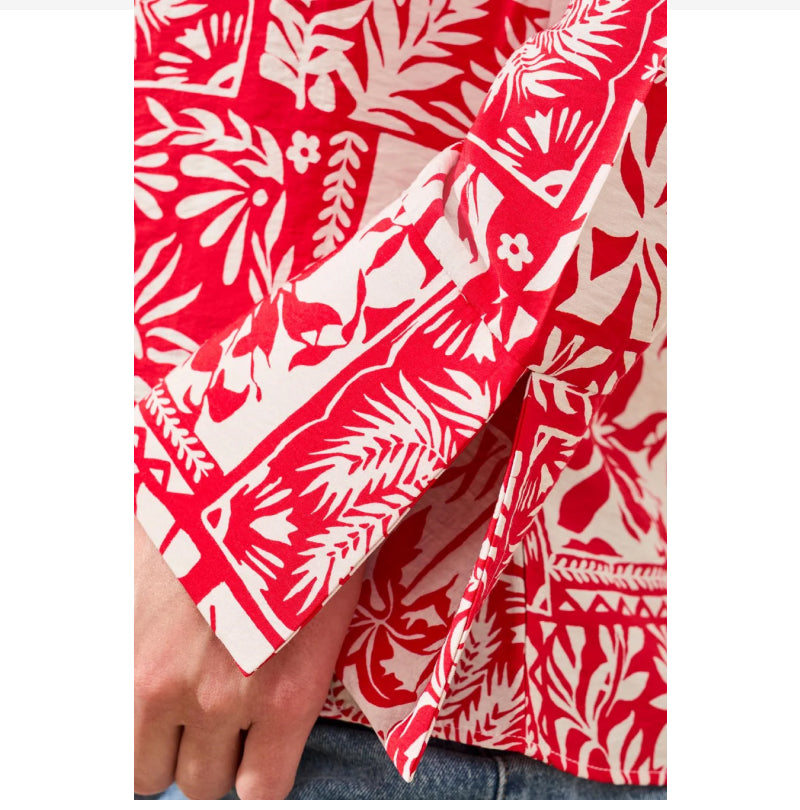 Red and white floral patterned fabric
