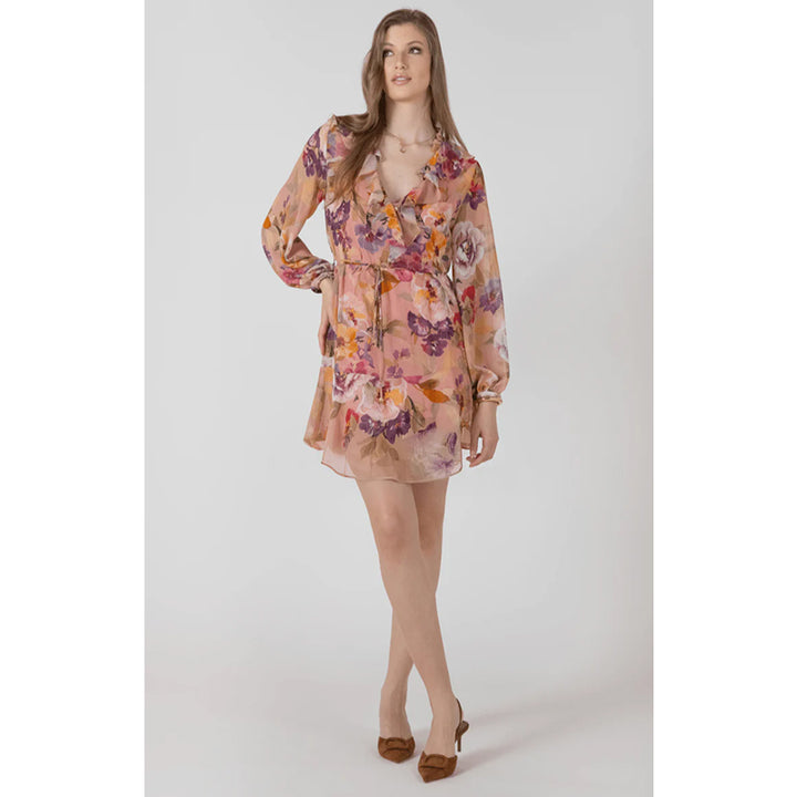 Woman wearing a floral dress on a white background