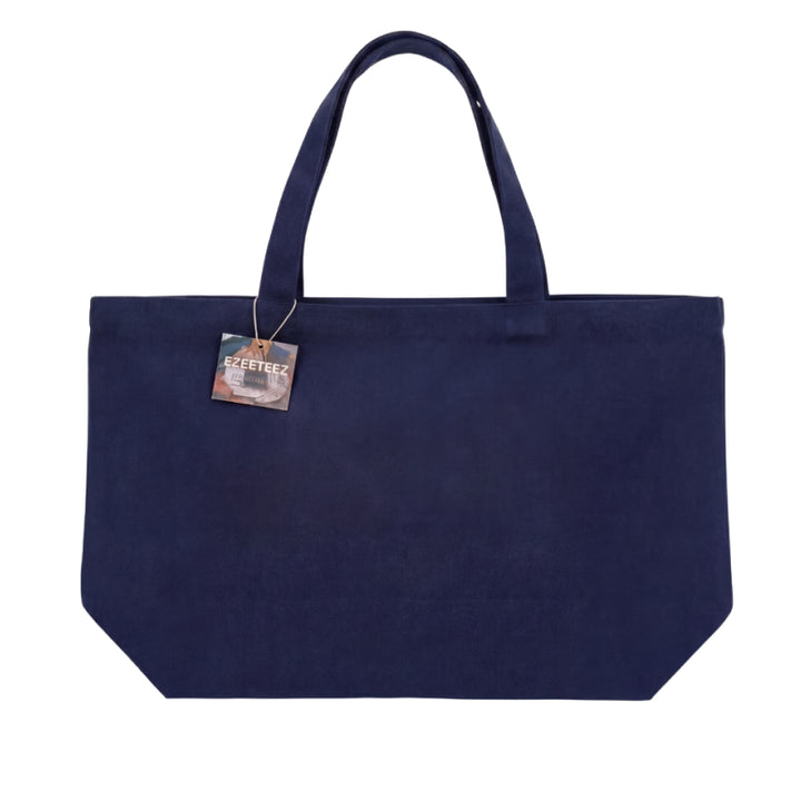 Navy blue tote bag with a visible brand tag on a white background