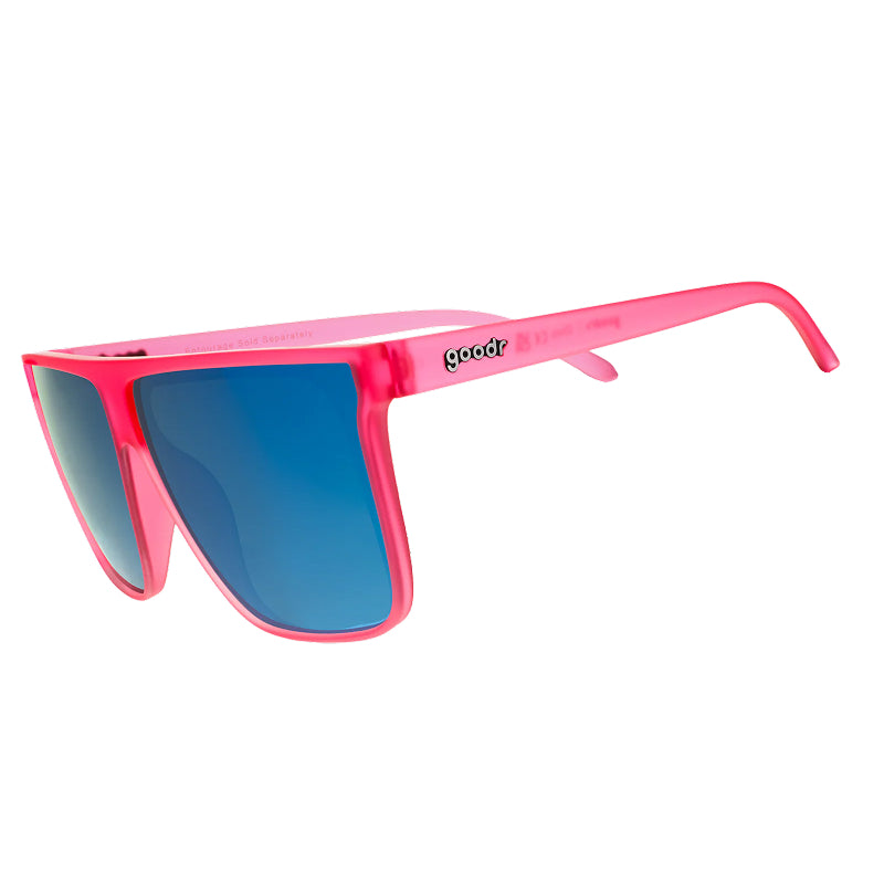 Pink sunglasses with blue gradient lenses on a white background