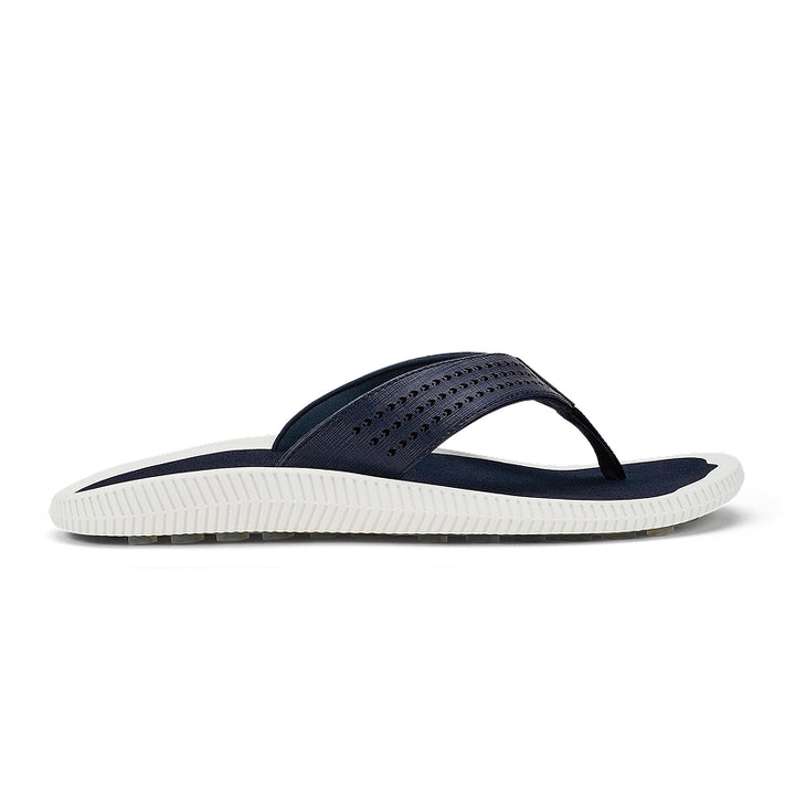 Navy sandal with white sole on a white background