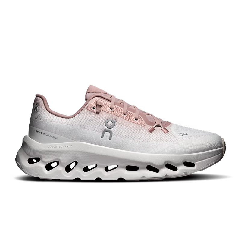 A single On running shoe in white and light pink, shown from the side against a plain white background.